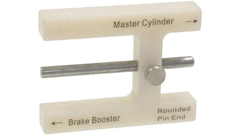 Merni alat za podešavanje dužine potisne poluge servo uređaja u odnosu na potisnu polugu glavnog kočionog cilindra u postupku Podešavanje dužine potisne poluge servo uređaja