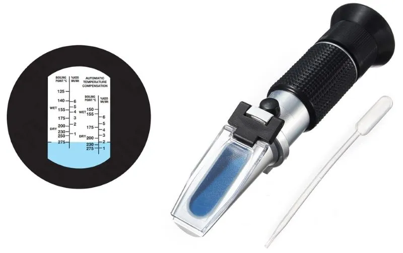 Refraktometar i pipeta za analizu kočione tečnosti u postupku Test kočione tečnosti refraktometrom